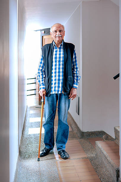 istock A 77-year-old Senior Indian Man With Walking Cane 2218002891
