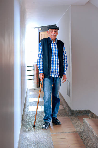istock A 77-year-old Senior Indian Man With Walking Cane 2218002895