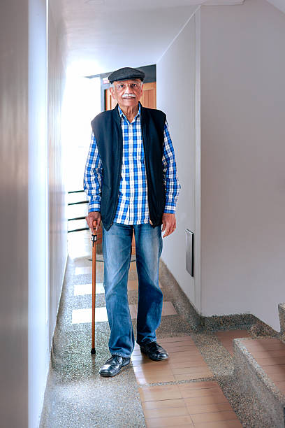istock A 77-year-old Senior Indian Man With Walking Cane 2218002920