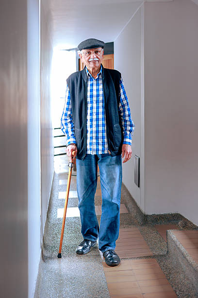 istock A 77-year-old Senior Indian Man With Walking Cane 2218002922
