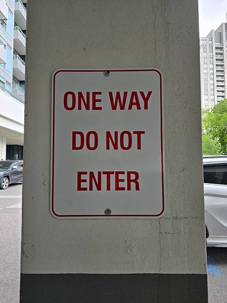 istock One Way Do Not Enter Traffic Sign on Concrete Wall 2218008897