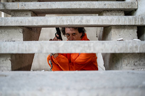 Inmate Hiding Under Staircase Wielding a Weapon, Noteworthy Suspenseful Scene