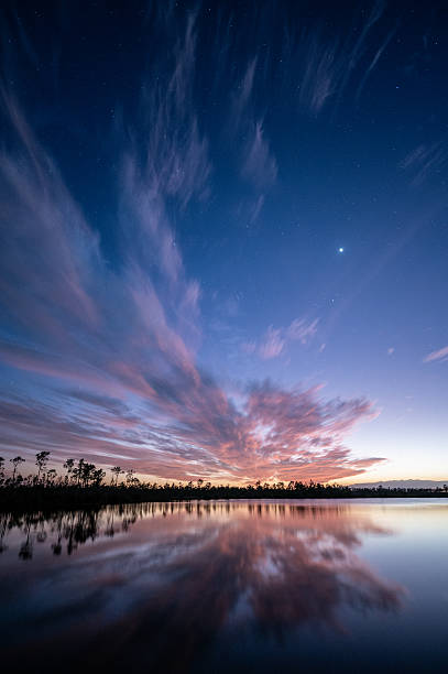 istock Venus and dramatic twilight cloudscape over lake in Everglades National Park. 2218014256