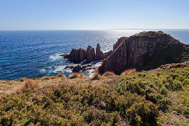 istock Dramatic Coastal Landscape with rugged cliffs, turquoise waters, and unique rock formations at Cape Woolamai, Phillip Island, Victoria, Australia 2218015642