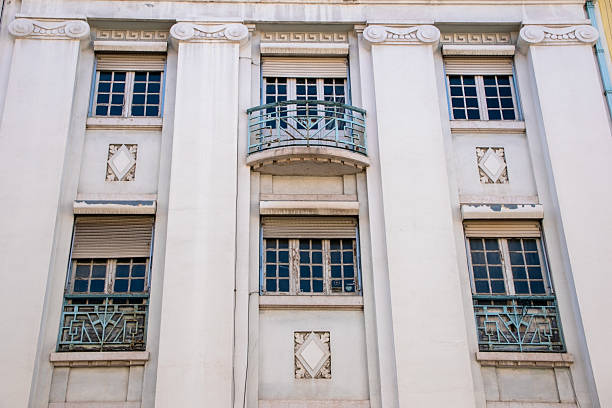 istock Elegant building facade with ornate architectural details and a balcony 2218016052