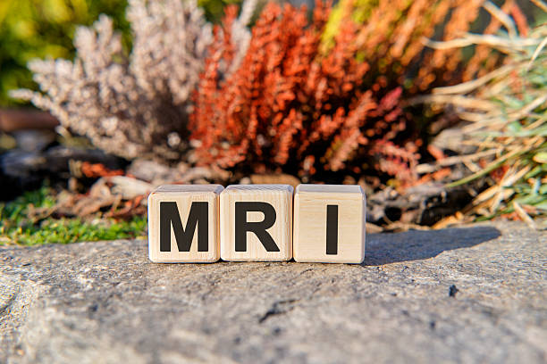 istock MRI - text on cubes standing on a stone on a natural background 2218017683