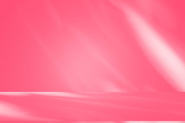istock Wall interior background, studio, and backdrops show products. with shadow from window color white and pink light. background for text insertion and presentation of product 2218022968