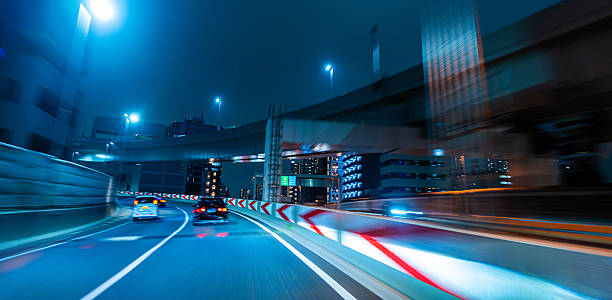 istock Curving Highway at Night Through Tokyo 2218032315