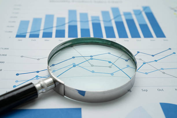 istock Magnifying glass on charts graphs paper. Financial development, Banking Account, Statistics, Investment Analytic research data economy. 2218033882