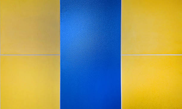 istock Yellow and blue wall background. Pastel painted wallpaper 2218034249