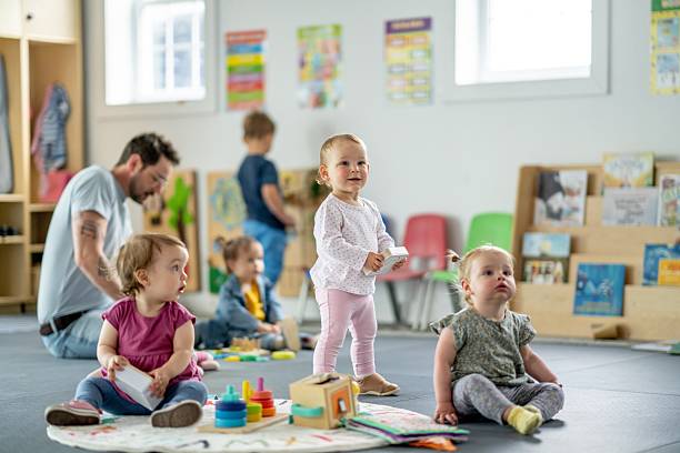 istock Young Children Playing and Learning in a Bright Daycare Environment 2218037776
