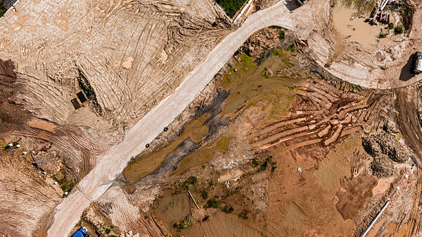 istock Aerial view of development of new road construction or overpass under construction 2218042232