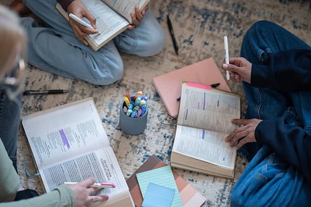 Group of Focused Individuals Engaging in Collaborative Bible Study Session