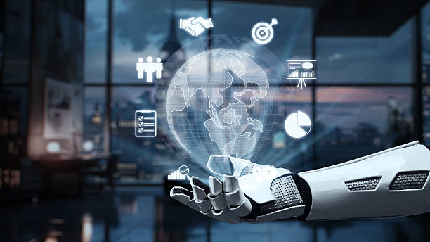 istock Futuristic robotic hand presenting global business icons in a modern office environment with digital graphs and technology visuals in the background. Auvana 2218043610