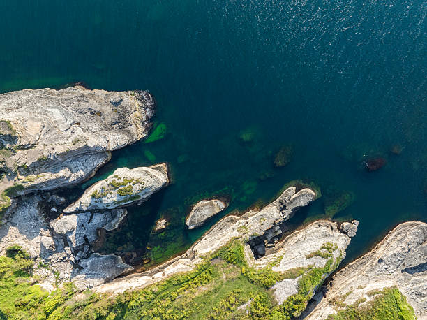 istock Aerial view directly above rugged coastal cliff 2218044502