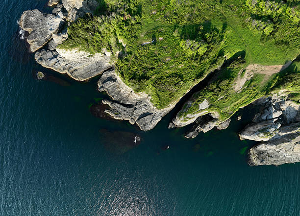 istock Aerial view directly above rugged coastal cliff 2218044512