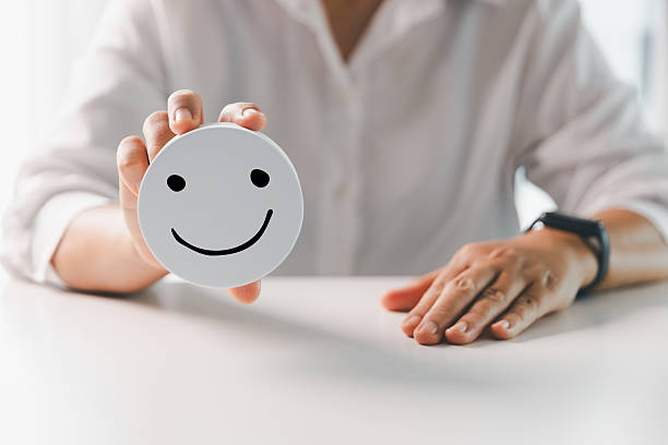 istock Client show feedback, smiley face sign. Service rating, satisfaction concept. happy smile face, good feedback rating, positive customer review, experience, satisfaction survey, smiley mental health. 2218053424