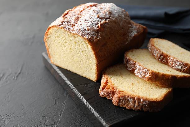 istock Freshly baked sponge cake on black table, closeup 2218053912