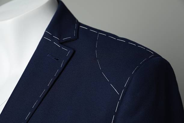 istock Semi-ready jacket on mannequin against grey background, closeup 2218054691