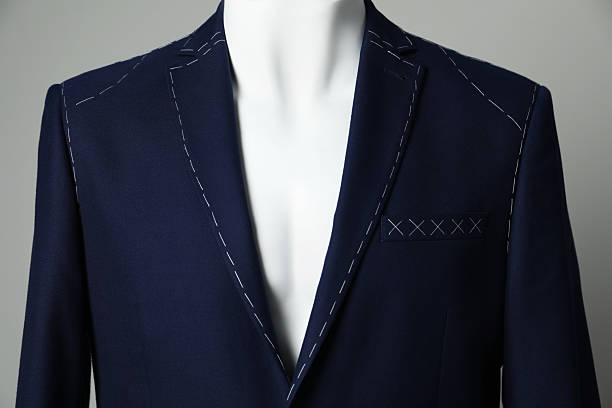 istock Semi-ready jacket on mannequin against grey background, closeup 2218054706