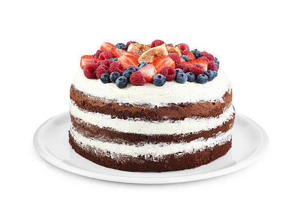 istock Delicious chocolate sponge cake with berries isolated on white 2218054916