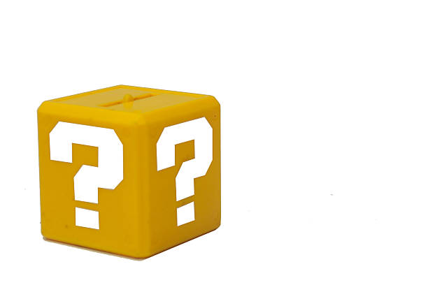 istock a little yellow box with a big white question mark printed on each face. It recalls a graphic element of a famous platform, isolated on white background 2218054932