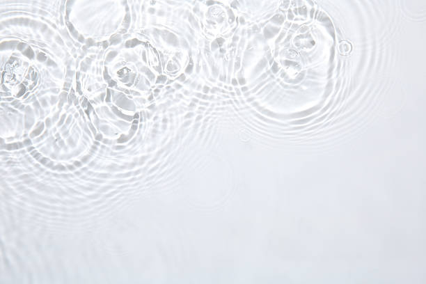 istock Rippled surface of clear water on white background, top view 2218055512