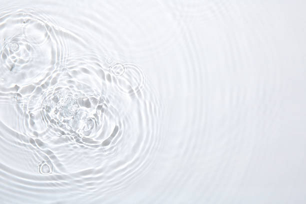 istock Rippled surface of clear water on white background, top view 2218055513
