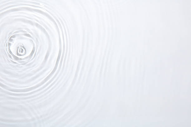 istock Rippled surface of clear water on white background, top view 2218055514