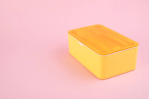 istock Plastic lunch box with cutlery on light pink background. Space for text 2218056346