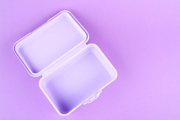 istock Plastic lunch box on lilac background, top view 2218056351