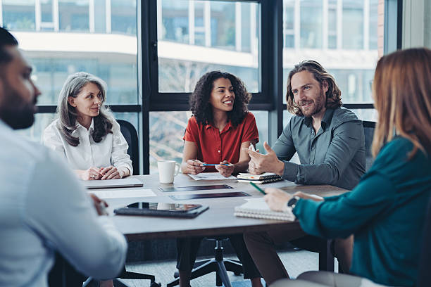 istock Group of entrepreneurs having a discussion 2218057395