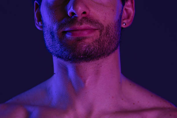 Portrait of a Man with Beard under Neon Lights