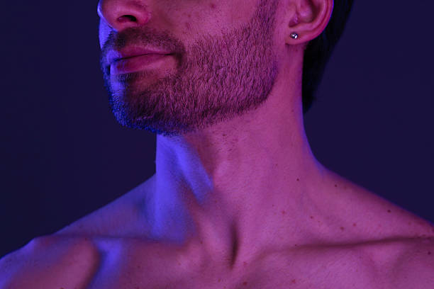 istock Portrait of a Man with Beard under Neon Lights 2218058862