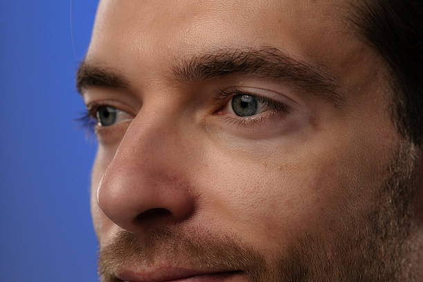 istock Portrait of a Man with Beard on a Blue Background 2218060250