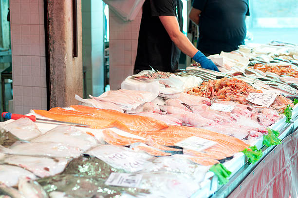 istock Fresh seafood display at a fish market. 2218060466