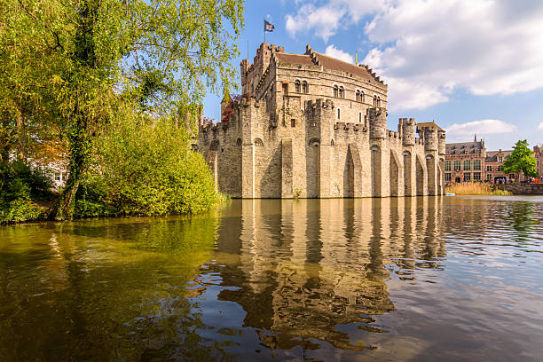 Medieval Gravensteen Castle along the River Leie, in Ghent, Belgium