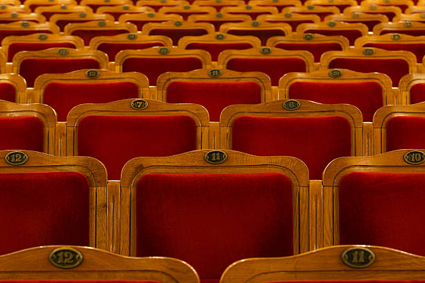 Row of red seats in theatre