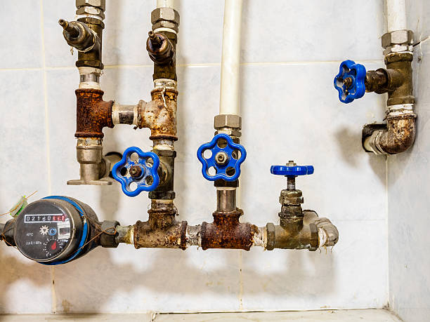 istock old water supply taps and water flow meter at home 2218062625