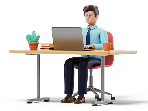 istock A man sits at a desk working on a laptop 2218065580