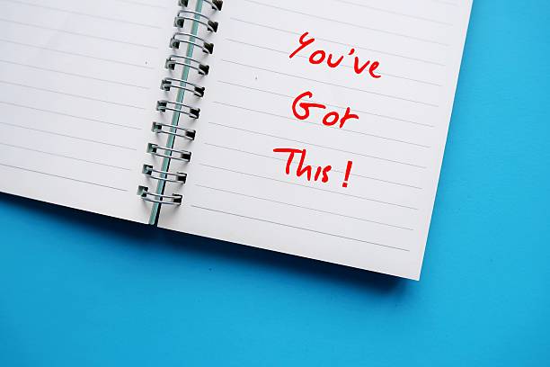 istock Notebook on blue background with handwritten text - You've got this - Self motivation or message to encouraging someone they are capable of succeeding - means you can do it - to boost confidence and handle challenge 2218065703