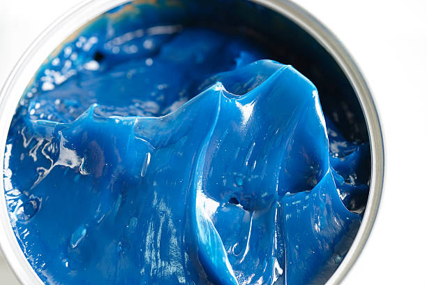 istock Grease and ball bearing, Blue premium quality synthetic lithium complex grease, high temperatures and machinery lubrication for automotive and industrial. 2218067787