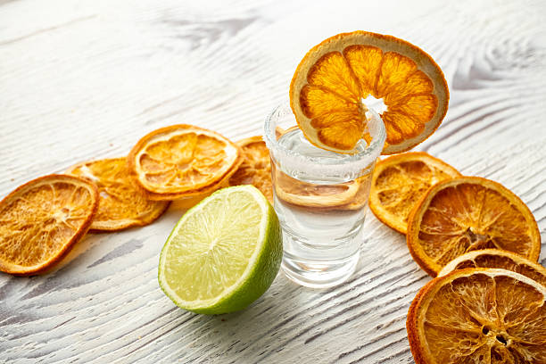 istock lime lemon and shot vodka drink 2218073370