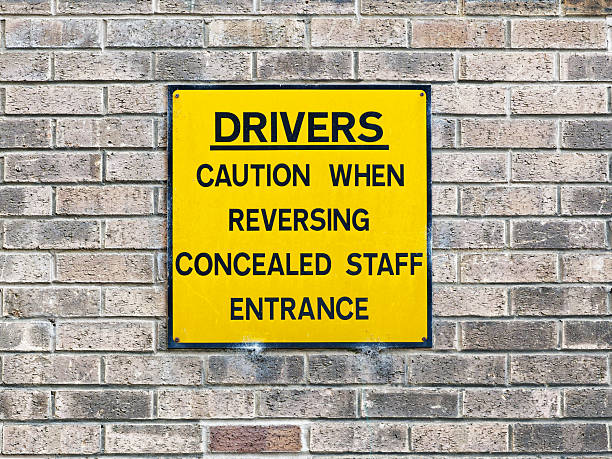 istock Reverse park please sign at public car park 2218074678