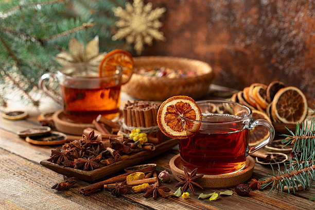 istock Christmas herbal tea with ingredients on a old wooden table. 2218076523
