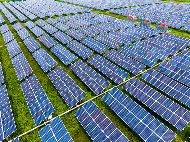 istock Large solar farms on the grassland 2218081182