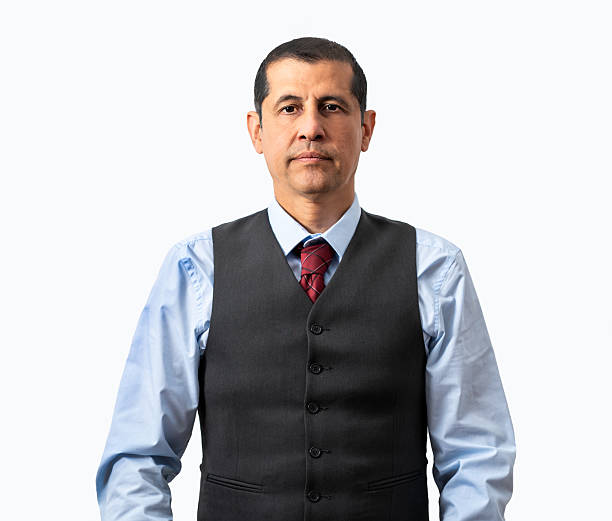 A butler at attention over his arm. Clipping path around the butler.
