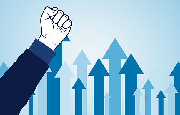 istock Motivational Concept Depicting Fist with Rising Arrows for Progress 2218085476