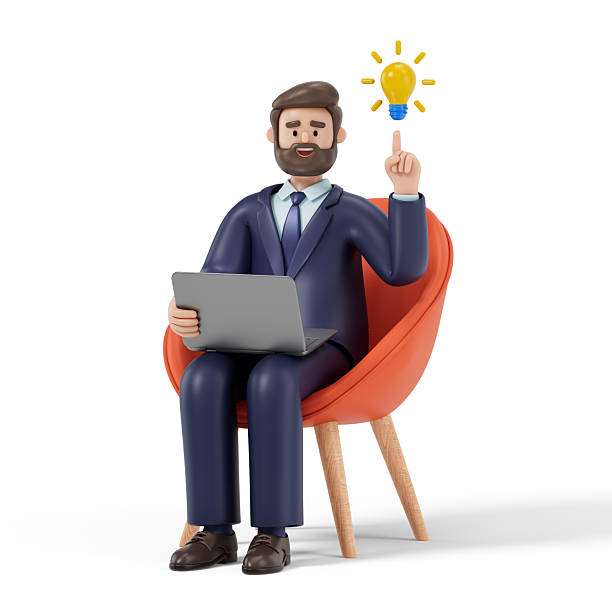 istock A man sits on an orange chair holding a laptop 2218086483