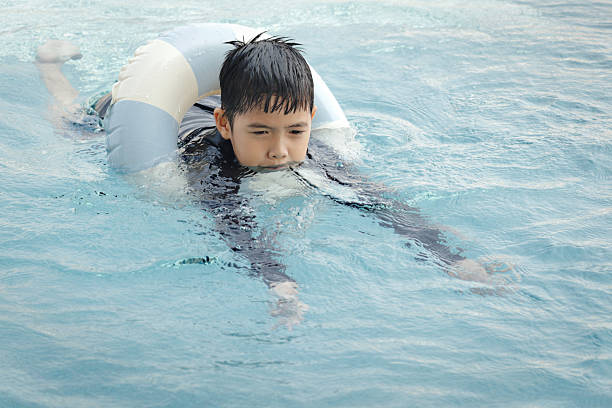 Family having fun in pool